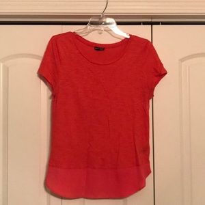 Express orange/coral short sleeve top.